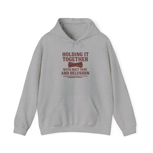 Holding It Together With Duct Tape and Delusion Hoodie – Funny Mental Health Graphic Sweatshirt